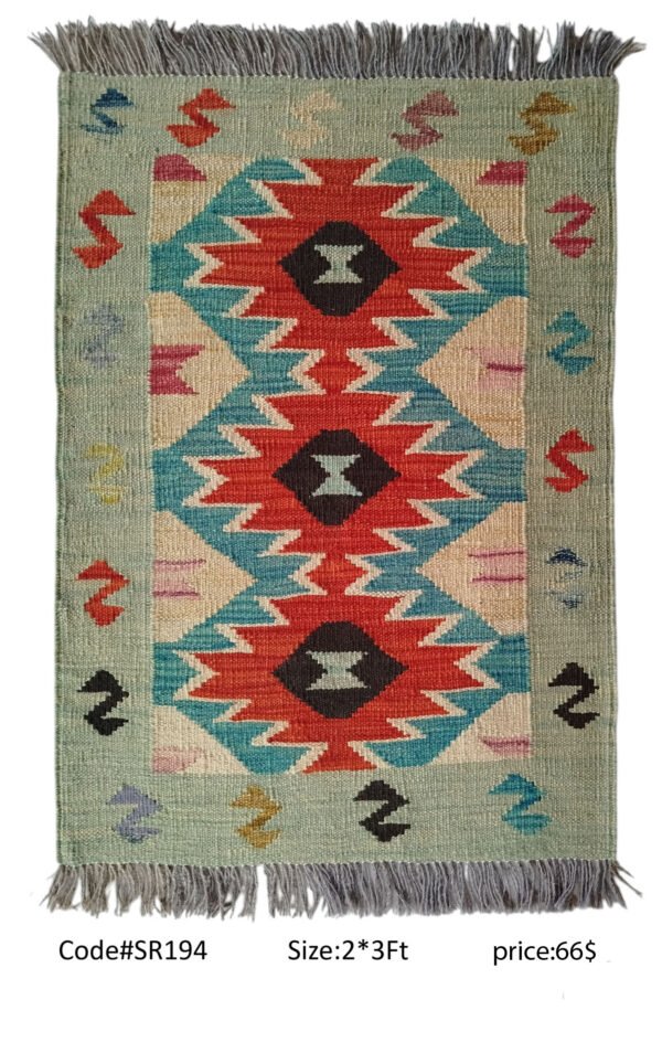 Green, red, teal, cream, and multi-color 2 × 3 ft handwoven Afghan wool rug with diamond medallions