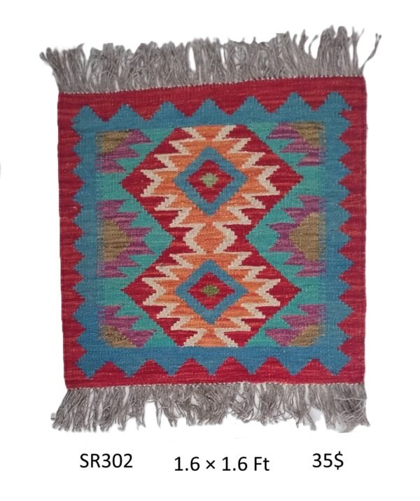 Red, teal, orange, cream, and multi-color 1.6 × 1.6 ft handwoven Afghan wool rug with diamond medallions